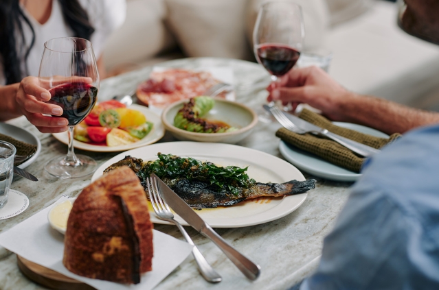 Closeup of couples meal at restaurant